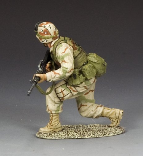 Crouching Ranger Moving Forward. Toy soldier in military uniform with backpack and rifle on a gray background