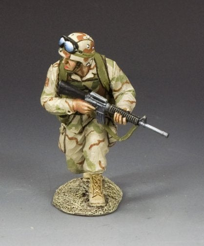 Crouching Ranger Moving Forward. Toy soldier military miniature moving forward.