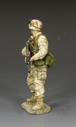 Ranger Covering the Rear. Desert-uniformed toy soldier Ranger turns with M16A2 at the ready, guarding the rear.