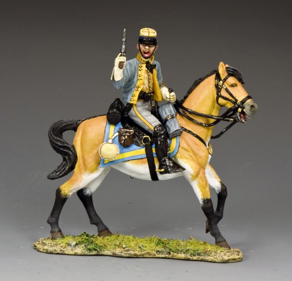 Military miniature of a Confederate cavalry officer on horseback, wearing a yellow kepi and gray uniform, holding a revolver mid-charge.