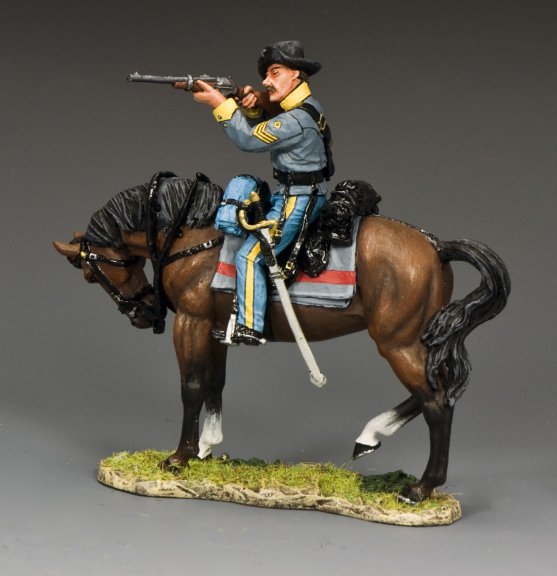 Military miniature of a Confederate cavalry sergeant on horseback firing a Sharps carbine, dressed in gray uniform with yellow trim.