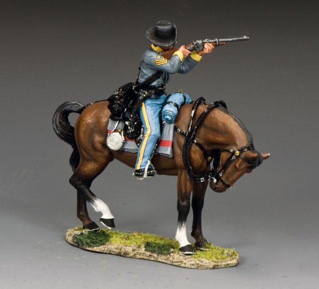 Confederate Cavalry Sgt. Firing Carbine a Model figure of a soldier on horseback with a rifle against a gray background