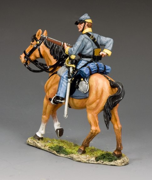 Rear view of military miniature Confederate Cavalry Trooper Loading Carbine on horseback wearing gray uniform and blue trousers.
