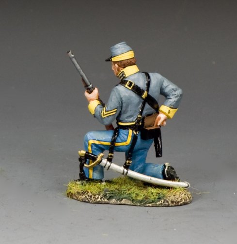 Toy soldier figure in Civil War uniform with rifle on a gray background