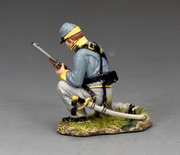 Toy Soldier Model figure of a soldier with a rifle and hose on a gray background