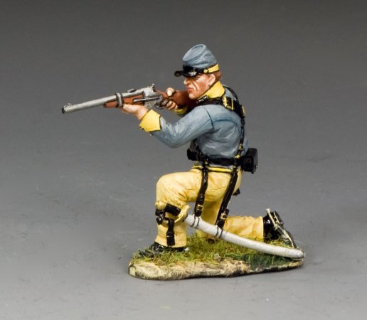 Toy soldier military miniature in Civil War uniform with rifle on a gray background