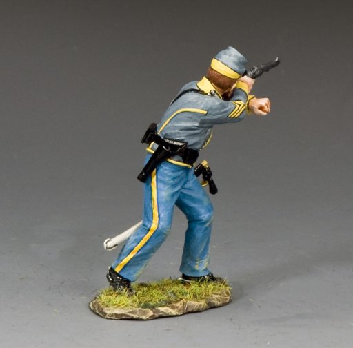 toy soldier Model of a soldier in blue uniform with a rifle on a gray background