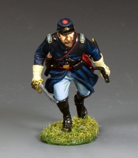 Toy Soldier Union Infantry lieutenant charging forward with sword drawn, dressed in blue frock coat and kepi, leading troops into battle.