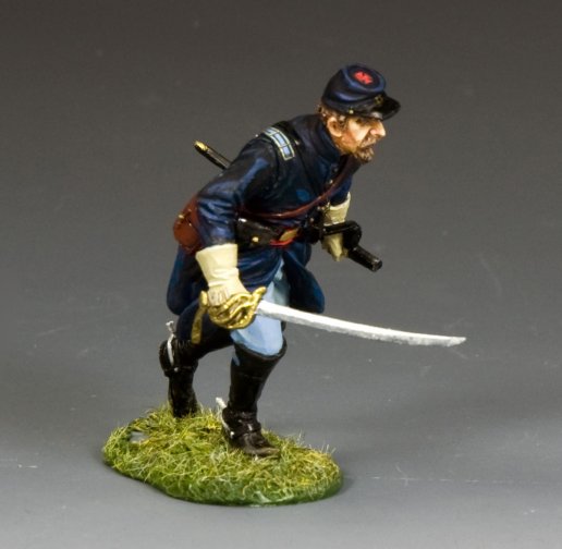 Military miniature figure of a historical soldier with a sword on a gray background