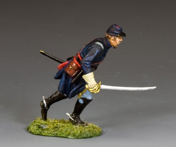 Toy soldier figure of a soldier in uniform with a sword on a gray background