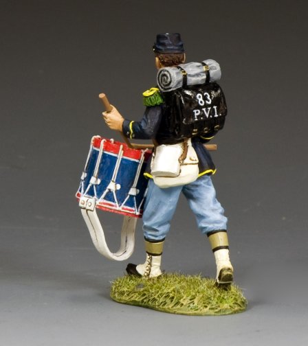 Military miniature Figurine of a soldier with a drum and backpack on a gray background
