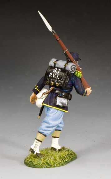 Toy Soldier Model Infantry Advancing figure of a historical soldier with a rifle and backpack on a gray background