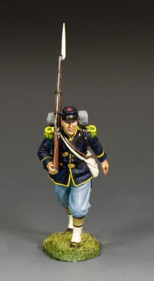 King & Country’s Infantry Advancing is a military miniature toy soldier in a blue uniform, running forward with rifle and bayonet, set on a grassy base.