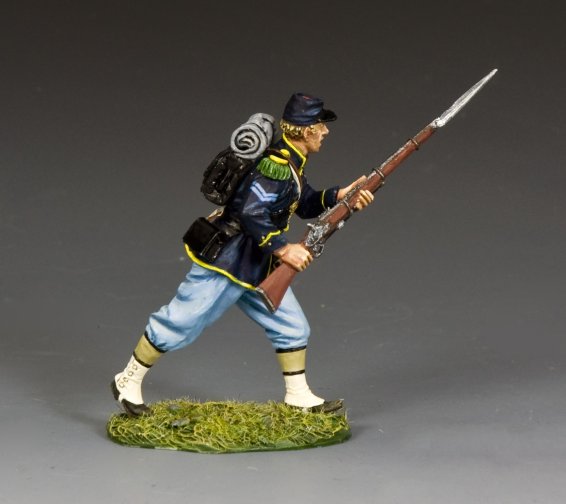 Model of a Civil War toy soldier holding a rifle on a gray background