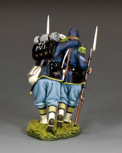 The Helping Wounded military miniature Model of a historical soldier with equipment on a gray background