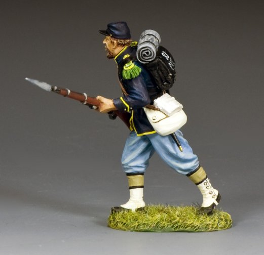Toy soldier Model figure of a Civil War soldier with a rifle and backpack on a gray background