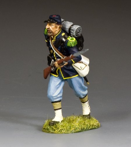 Model of a Civil War Union soldier with rifle and backpack on a gray background