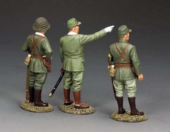 Three military miniatures in green uniforms on a gray background
