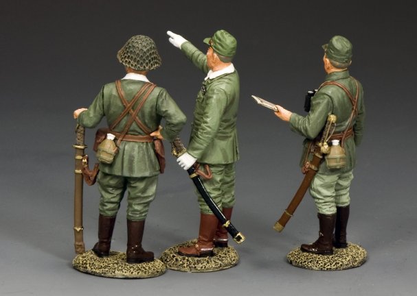 Three model soldiers in green uniforms with rifles on a gray background