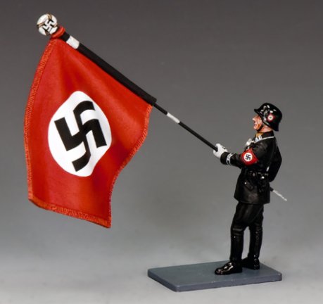 Toy figure of a soldier holding a Nazi flag on a gray background