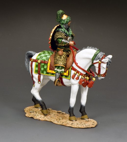 Saladin figure in ornate green and gold armor atop white Arab horse, capturing the noble Muslim leader’s grandeur and legacy.