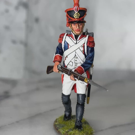 360 view of King & Country FLI Advancing w/Musket Levelled, French Light Infantry advancing with Charleville musket leveled at waist and bayonet forward, red plume shako, blue coat with red facings, 1/30 60mm matte figure, NA530