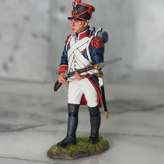 360 view of King & Country FLI Advancing Port Arms, French Light Infantry advancing with Charleville musket and fixed bayonet held across body at port arms, red plume shako, blue coat with red facings, 1/30 60mm matte figure, NA531