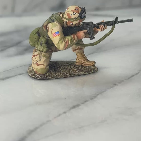 360 view of Collectible toy soldier miniature army men Ranger Kneeling.