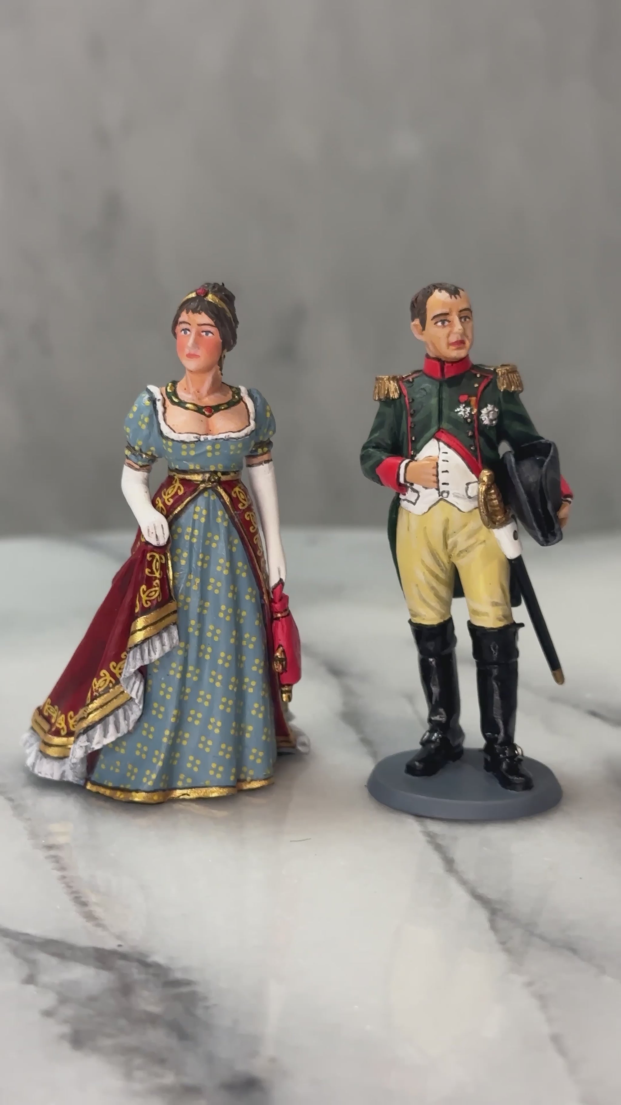 360 view of toy soldier figurines Napoleon and Josephine.