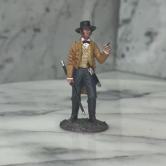 360 view of Collectible toy soldier miniature army men James Bowie at the Alamo.