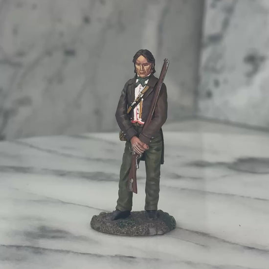 360 view of Collectible toy soldier miniature army men David Crockett at the Alamo in brown jacket.