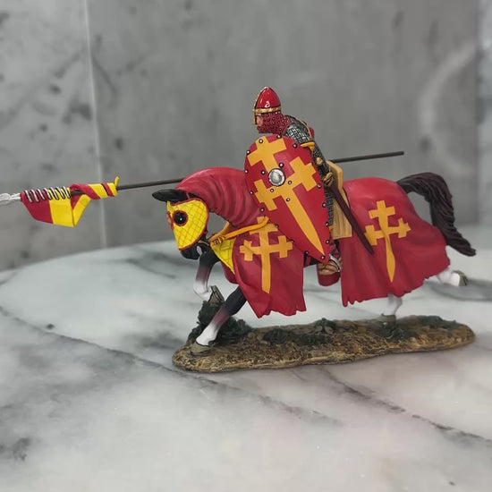 360 view of The Red Swabian Knight toy soldier on a marble surface.