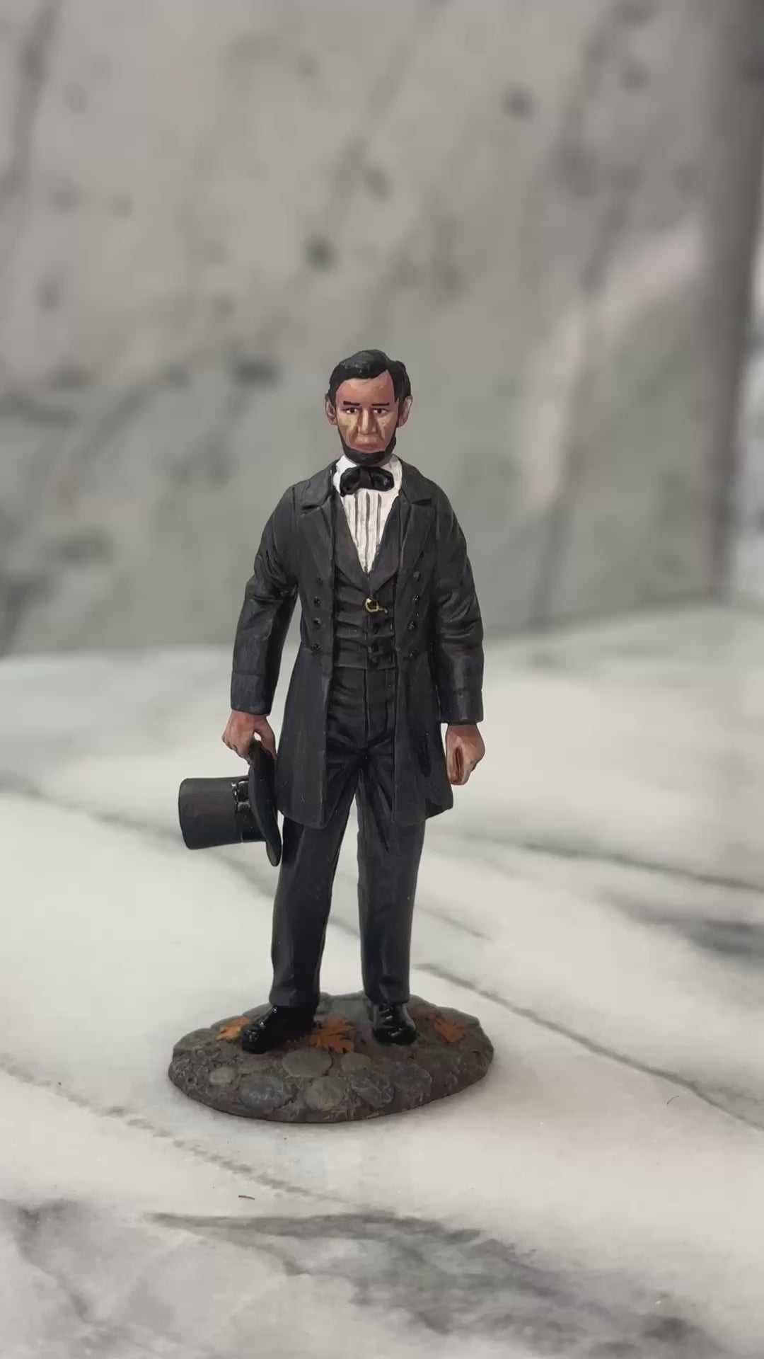 360 view of Collectible toy soldier miniature Abraham Lincoln.