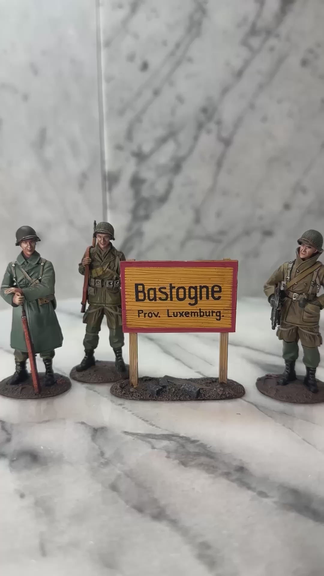 360 view of  collectible toy soldier figurines welcome to Bastogne.