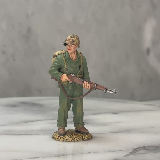 360 view of Watching Marine toy soldier.