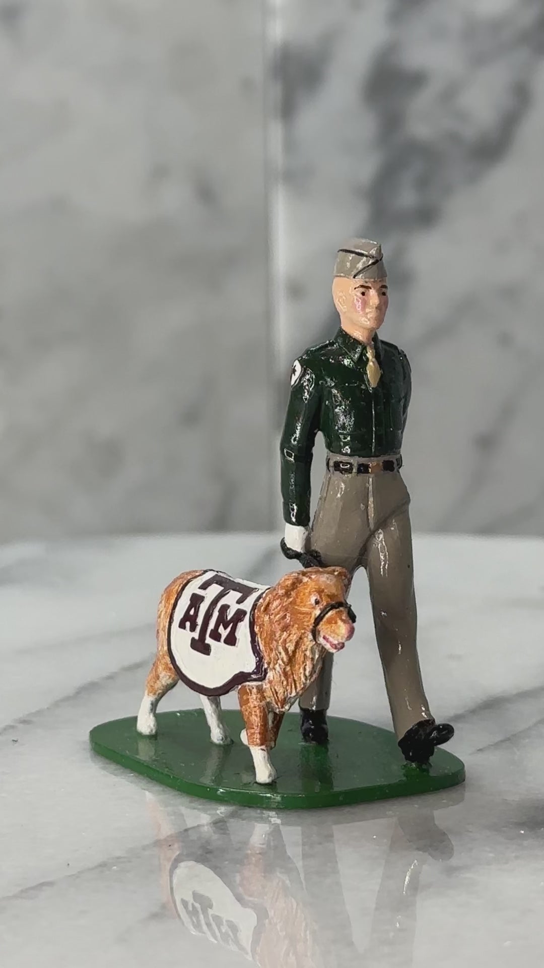 360 view of Collectible toy soldier army men Texas A&M Mascot and Handler.