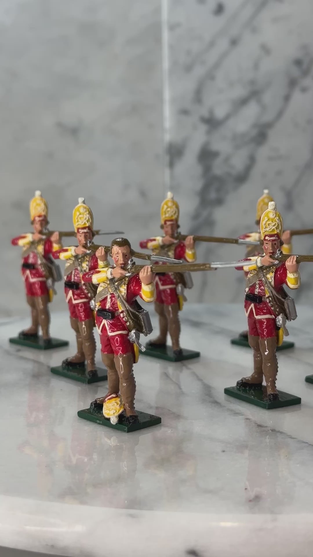 360 view of Collectible toy soldier miniature set British Grenadiers.
