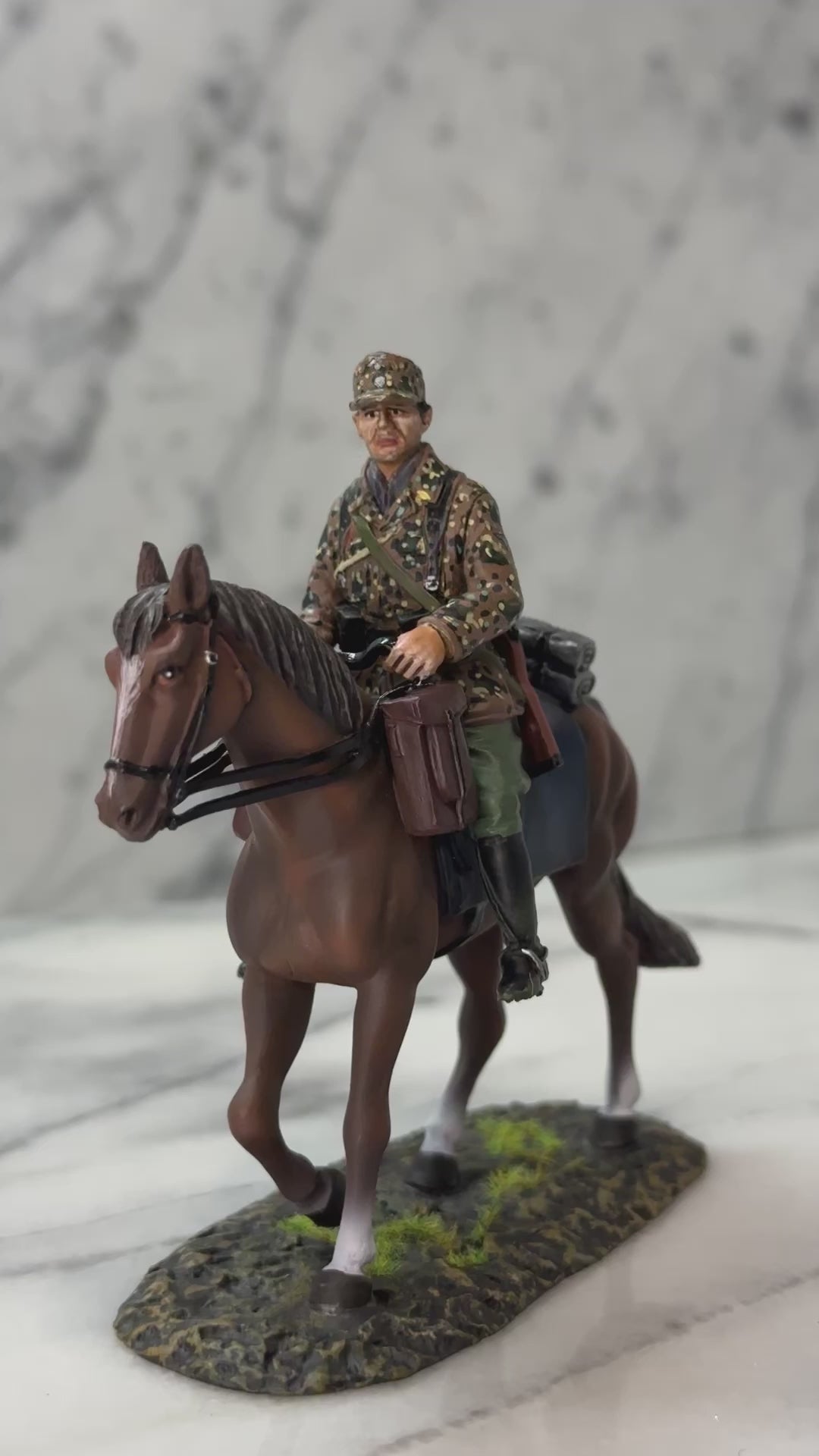 360 view of Collectible toy soldier miniature army men figurine SS Cavalry Trooper.