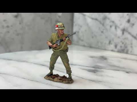 360 view of Collectible toy soldier miniature army men Standing Ready.