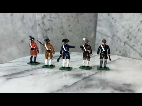 360 view of Collectible toy soldier miniature set Minute Men. Five soldiers in civilian clothing.