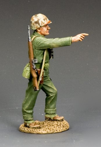 WWII USMC Lt. Col. Chesty Puller military miniature pointing ahead with pipe in hand and M1 Carbine slung over shoulder. 