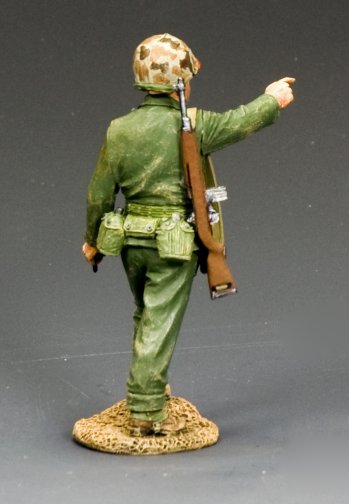 Lieut. Col Lewis 'Chesty' Puller USMC. Model figure of a soldier in green uniform with a rifle on a gray background