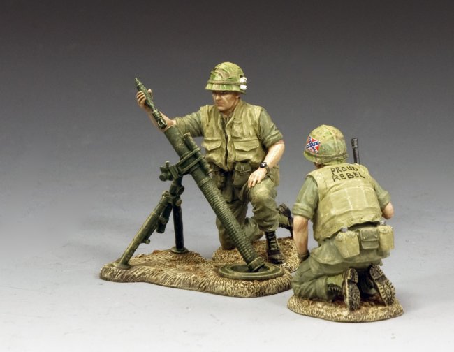 Marines Mortar Team. Two toy soldiers in military gear on a gray background