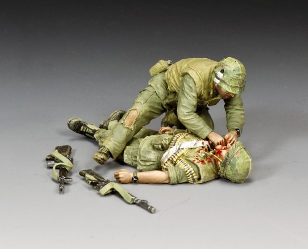 Toy Soldier set. Vietnam War medic kneels over wounded Marine during Battle of Hue, inspired by Don McCullin's iconic 1968 photograph.