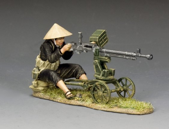 Military miniature of a female Viet Cong gunner in black clothing and conical hat operating a DShK 12.7mm heavy machine gun on wheeled mount.