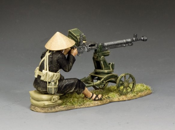 Viet Cong Heavy Machine Gun Set. Model of a soldier operating a machine gun with a gray background