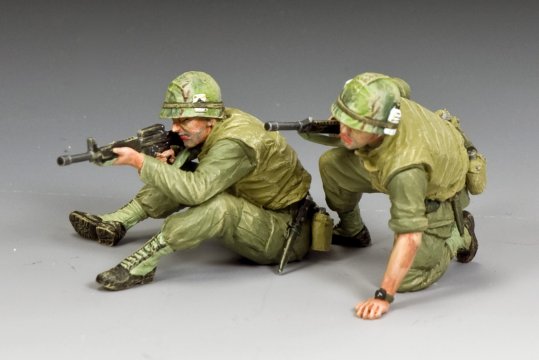 Vietnam War Marines in combat—one fires his M16 while the other, wounded, prepares to move. 1/30 scale matte toy soldier set.
