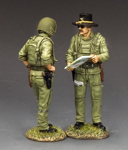 Helicopter Pilot & Copilot. Two toy soldiers in green uniforms on a gray background