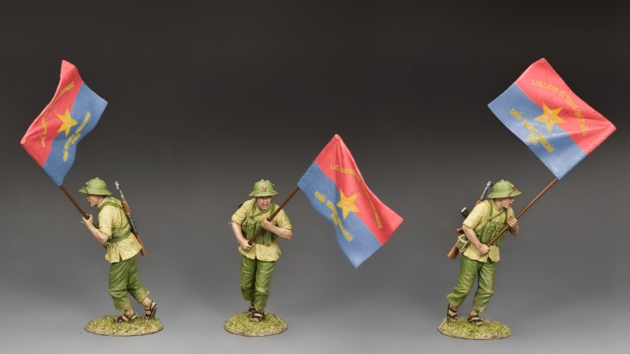 NVA Flagbearer. Three toy soldiers holding flags on a gray background