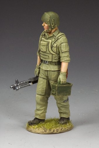Military miniature Vietnam Huey door gunner carrying M60 and ammo can, dressed in flak vest and helmet. 1/30 scale, matte finish.